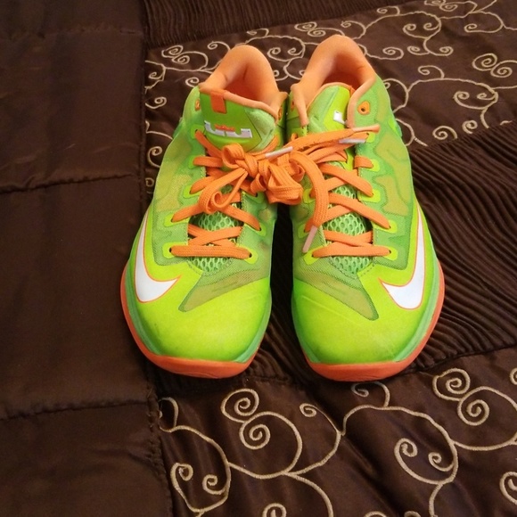 lime green and orange nike shoes